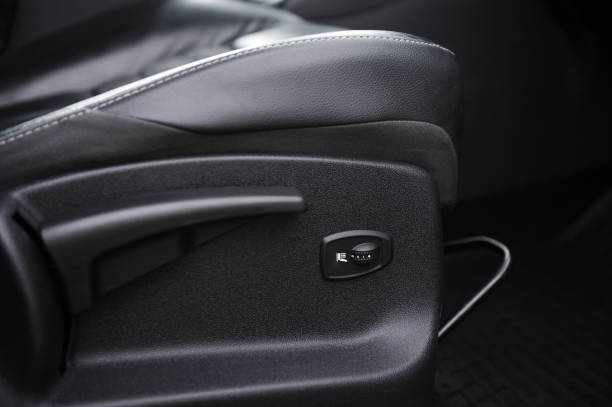 istock Car interior with buttons for adjusting seat position 1304157028