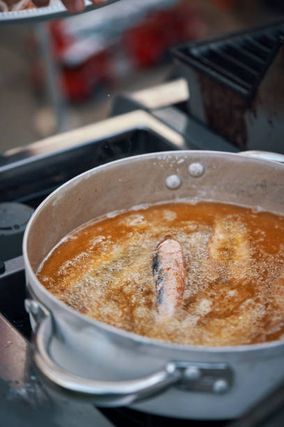 istock Frying Crispy Smelt Fish in Deep Oil 1304161440