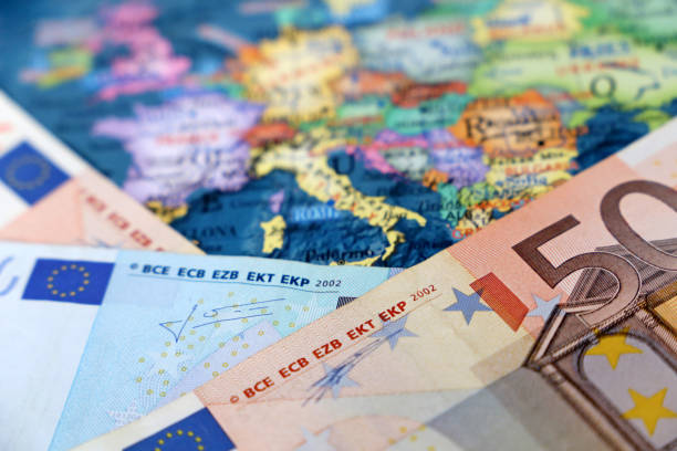 istock Euro banknotes on the Europe map 1304161716