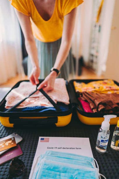 istock Packing suitcase for travel during COVID-19 1304164654