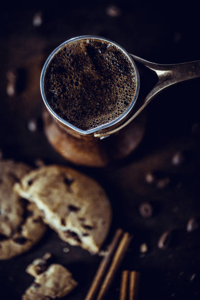 Coffee Turkish coffee and cookies on dark background turkish coffee pot cezve stock pictures, royalty-free photos & images