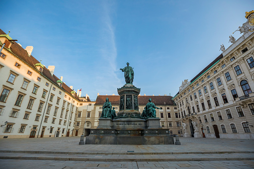 Vienna, Austria - August 28, 2019: Statue of Francis II, Amorem Meum Populis Meis. The statue, by Milanese sculptor Pompeo Marchesi, was erected in 1846; it lays in the In der Burg square of the Hofburg complex.