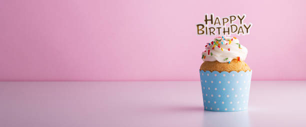 istock delicious beautiful cupcake cake for a birthday on a pink background 1304168199