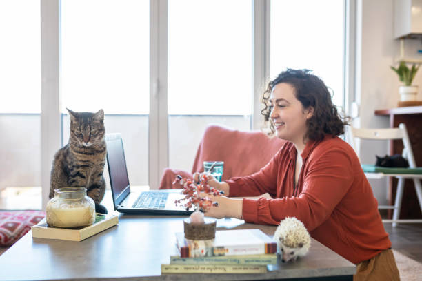 istock Young Woman living and working with pets 1304169447