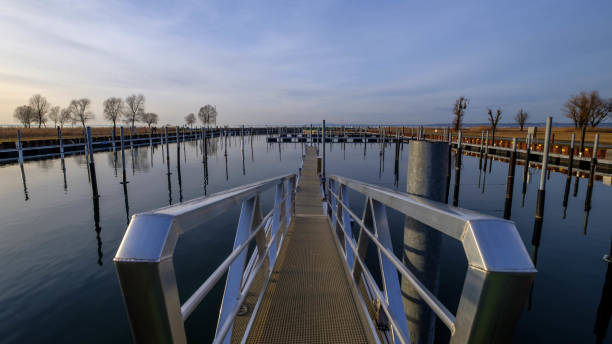 istock Steg to the empty boat harbour 1304169579
