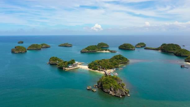 Hundred Islands National Park, Pangasinan, Philippines Aerial view of Small islands with beaches and lagoons in Hundred Islands National Park, Pangasinan, Philippines. Famous tourist attraction, Alaminos. pangasinan stock pictures, royalty-free photos & images