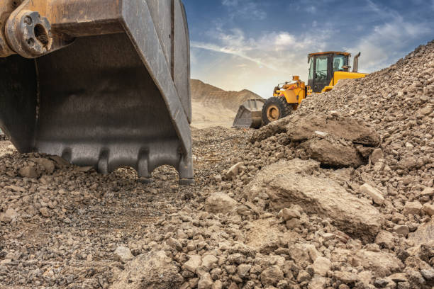 istock Group of excavator working on a construction site 1304172089