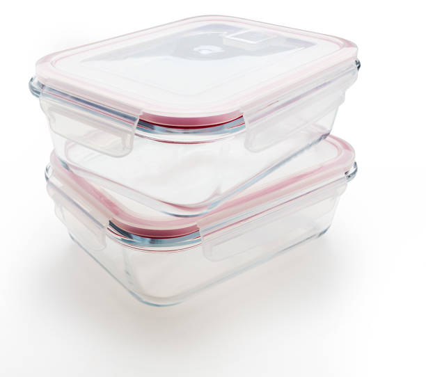 istock Two closed and empty glass tupperware. Isolated on white background. 1304175487