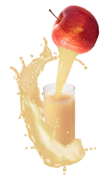 istock Image of an apple from which a stream of juice flows into a glass. 1304179738