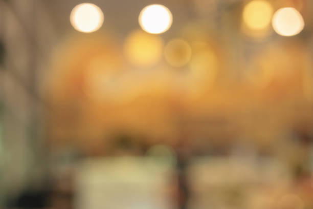 istock coffee shop cafe restaurant with abstract bokeh lights blur background 1304180156