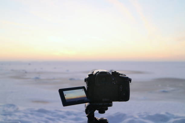 istock winter snowy landscape, camera in the foreground 1304183190