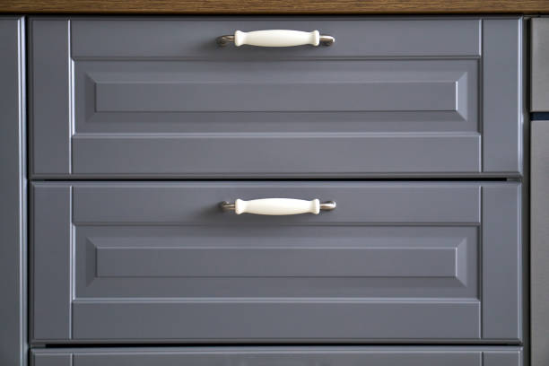 istock Doors with handles. Blue, white, grey. Wardrobe in the apartment. Style. MAcro. 1304185355
