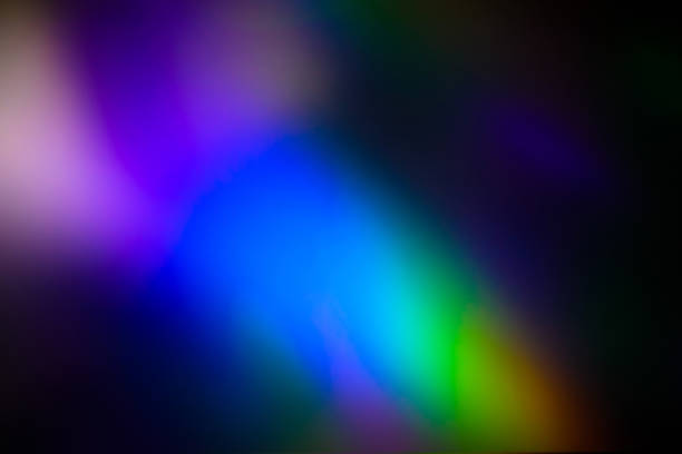 istock colorful warm rainbow light leaks on black background with dust texture 1304186565