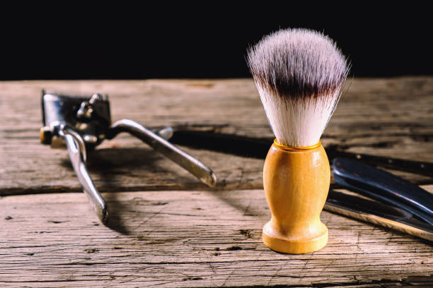 istock old barber tools on rustic wooden weathered background 1304189579