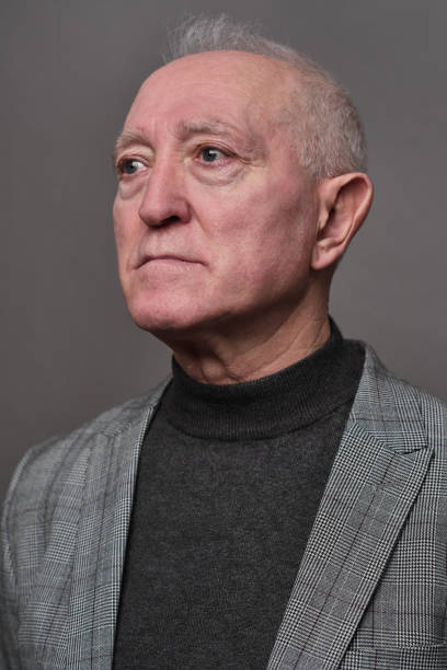 istock One senior man cut-out studio formal portrait. 1304190911