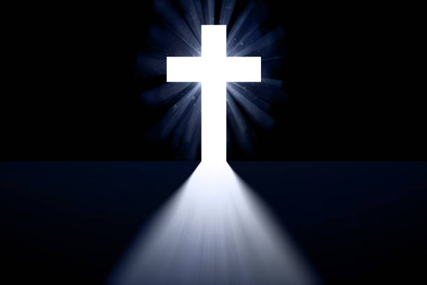 istock Cross shaped entrance door on black background and glare 1304191524