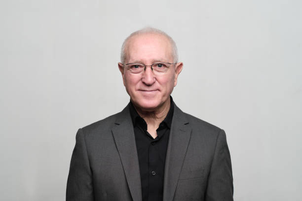 istock Senior man portrait in a suit. 1304191588