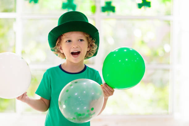 istock Kids celebrate St Patrick Day. Irish holiday. 1304195325