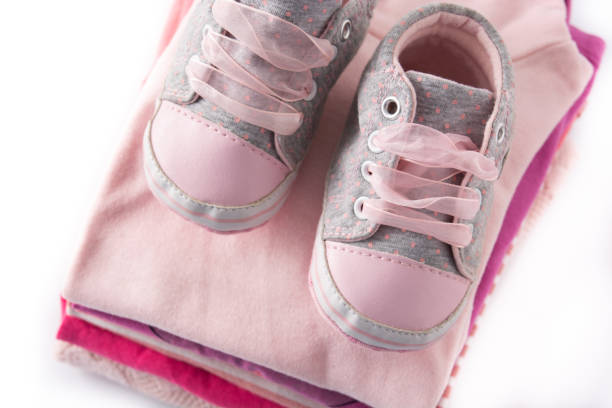 istock Baby rompers and baby shoes 1304195348