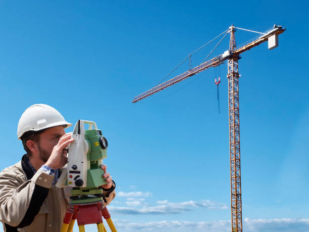 istock Geodetic engineer works on geodetic total station 1304195646