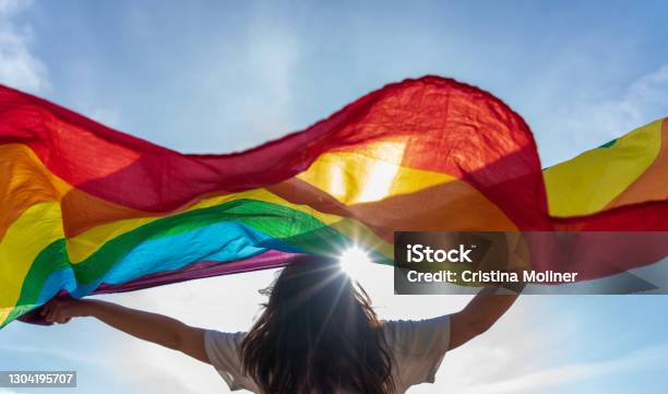 Young Woman Waving Lgbti Flag Stock Photo - Download Image Now - LGBTQIA Rights, LGBTQIA Pride Event, LGBTQIA People