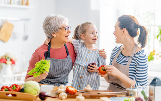 istock Happy family in the kitchen. 1304197574