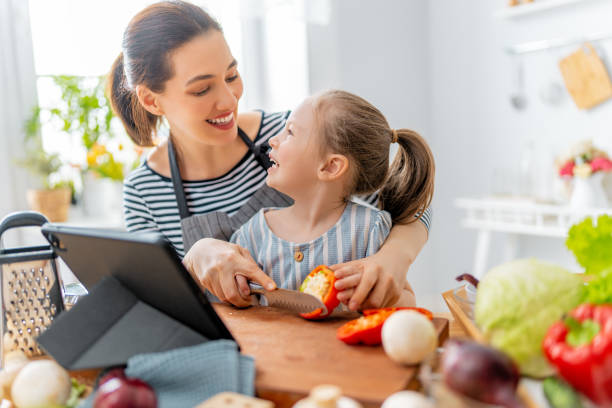 istock Happy family in the kitchen. 1304197594