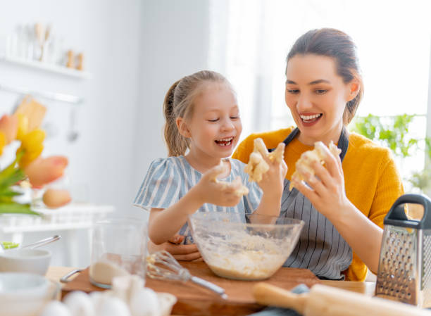 istock Happy family in the kitchen. 1304197603