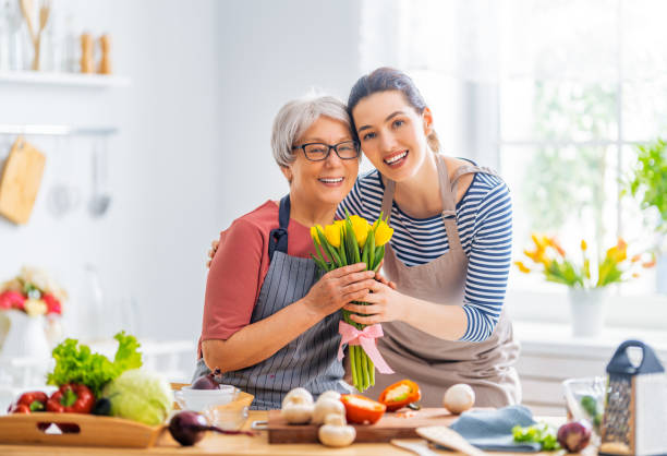 istock Happy family in the kitchen. 1304197608