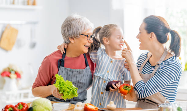 istock Happy family in the kitchen. 1304197609