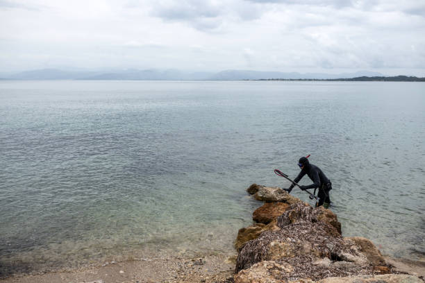 Wharf and islands in the sea, Aegina Island, Greece - Greelk seascape