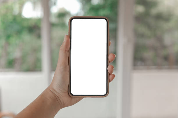 istock Women's hands holding cell telephone blank copy space screen. smart phone with technology concept 1304198827