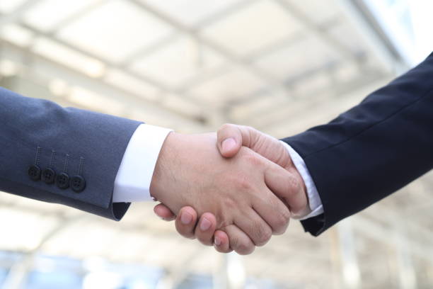 istock Business people shake hands and greet each other 1304199055