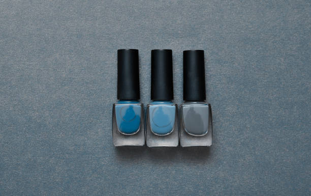 istock Nail polish in trendy blue color. 1304206949