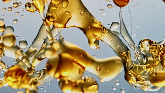 SLO MO LD Oil being poured into water