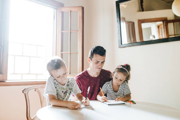 istock Father spending time with children 1304209415