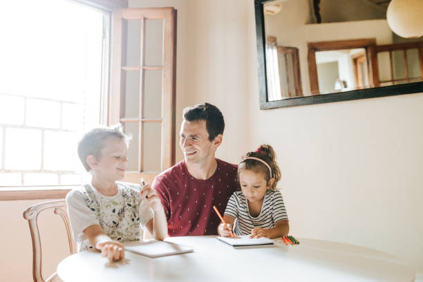 istock Father spending time with children 1304209418