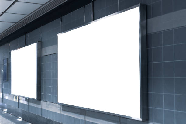 istock Blank billboard mock up signboard frame advertising located in subway underground hall, blurred background layout insert text for customer 1304215395