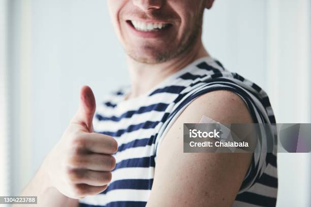 Happy Man After Vaccination Stock Photo - Download Image Now - Vaccination, Cold And Flu, Men