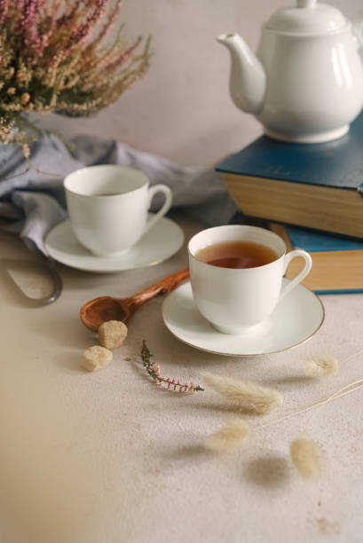 istock Still life with tea, books and flowers 1304228654