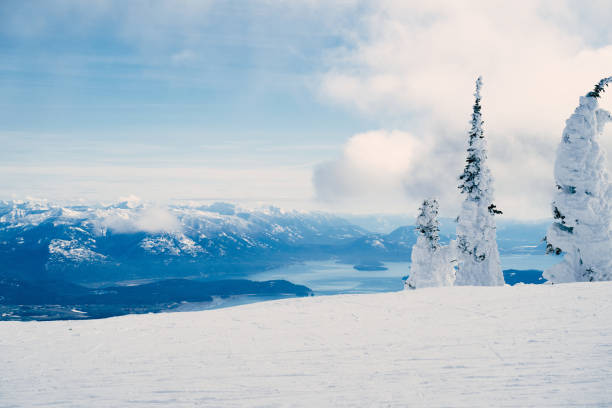 Snow capped, wind blown mountain peak near Cooke City, Montana, USA, North America.