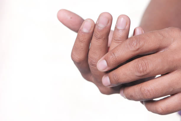istock man suffering pain in fingers isolated on white 1304229152