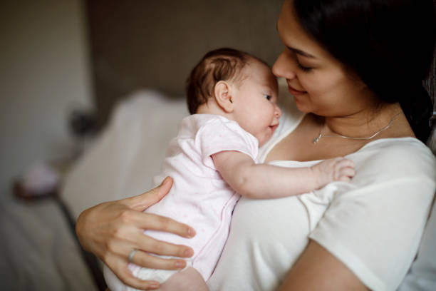 istock Mother and baby at home 1304231108