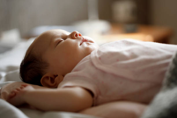 Cute little baby sleeping at home