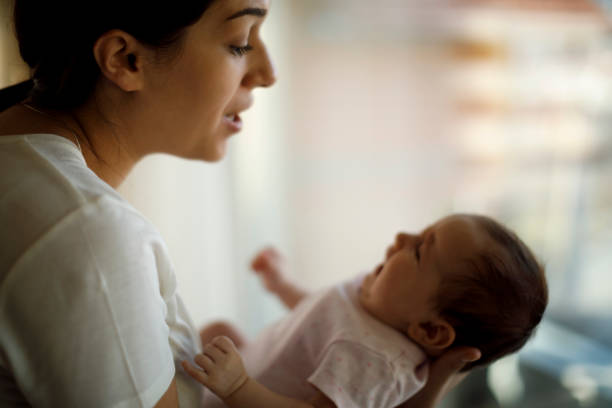istock Newborn baby crying in mother hands 1304231205