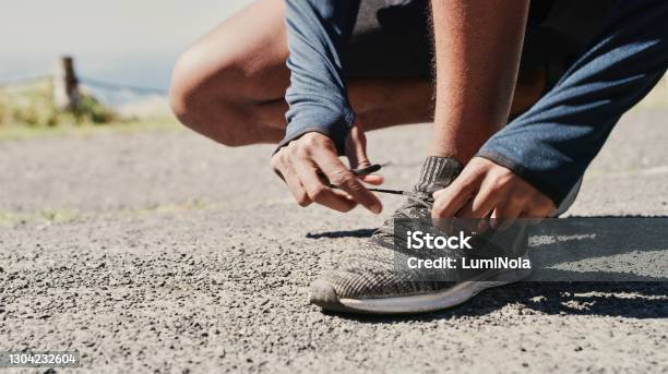 To Have A Good Run You Need Good Running Shoes Stock Photo - Download Image Now - Sports Shoe, Men, Tying