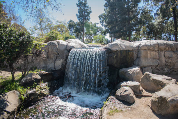 Small waterfall and river flows through Kenneth Hahn State Park in Los Angeles