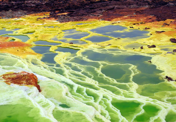Danakil Depression Landscape An African desert known for its extreme heat and inhospitality that is located in the Afar Depression, very close to the Red Sea. The deepest point of the desert reaches 100 meters below sea level. danakil desert photos stock pictures, royalty-free photos & images