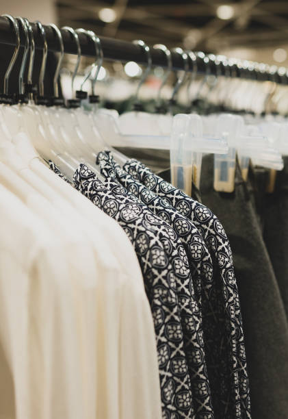 istock Rack with shirts in clothing store. 1304234393