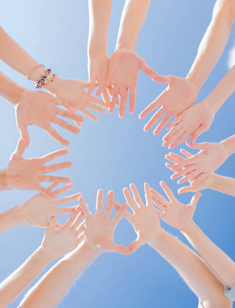 istock close up of circle of hands 1304235521